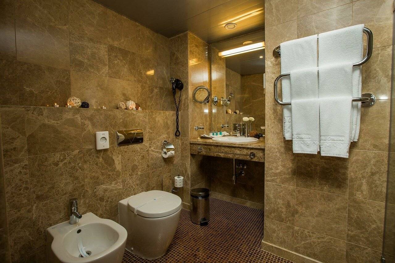 Фотографии номера Номер люкс премиум с 1 двуспальной кроватью в Гостинице Жемчужина Сочи