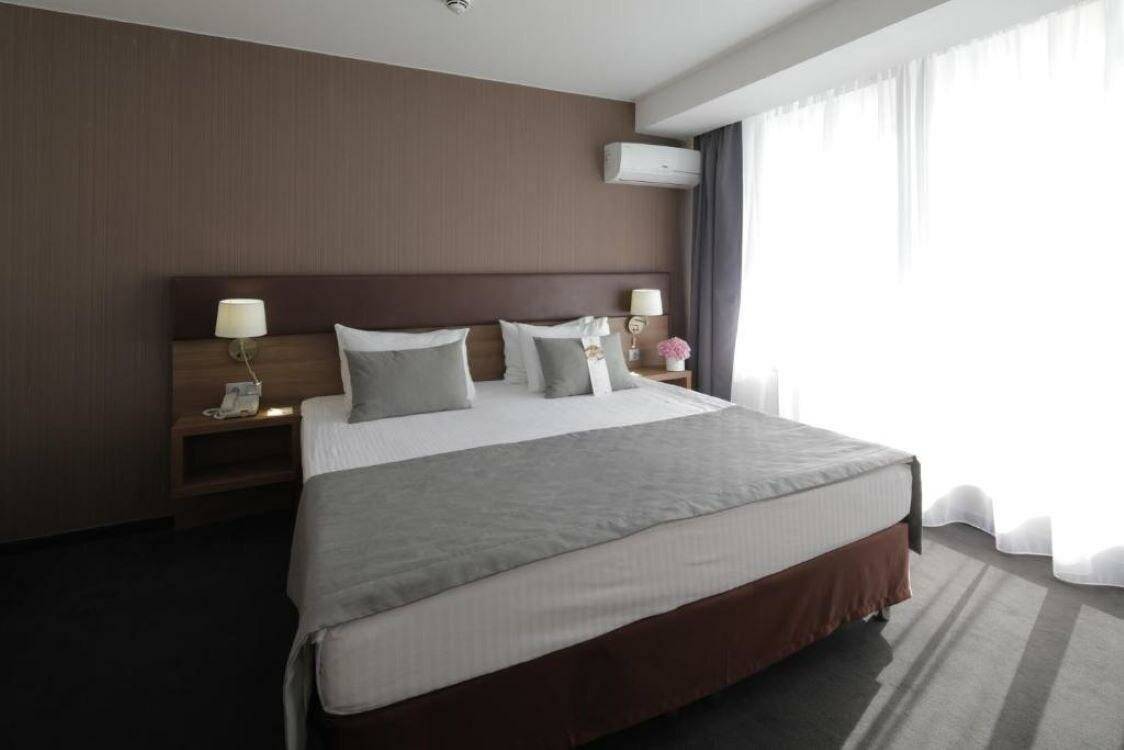 Фотографии номера Номер делюкс комфорт с 1 двуспальной кроватью в Гостинице Жемчужина Сочи