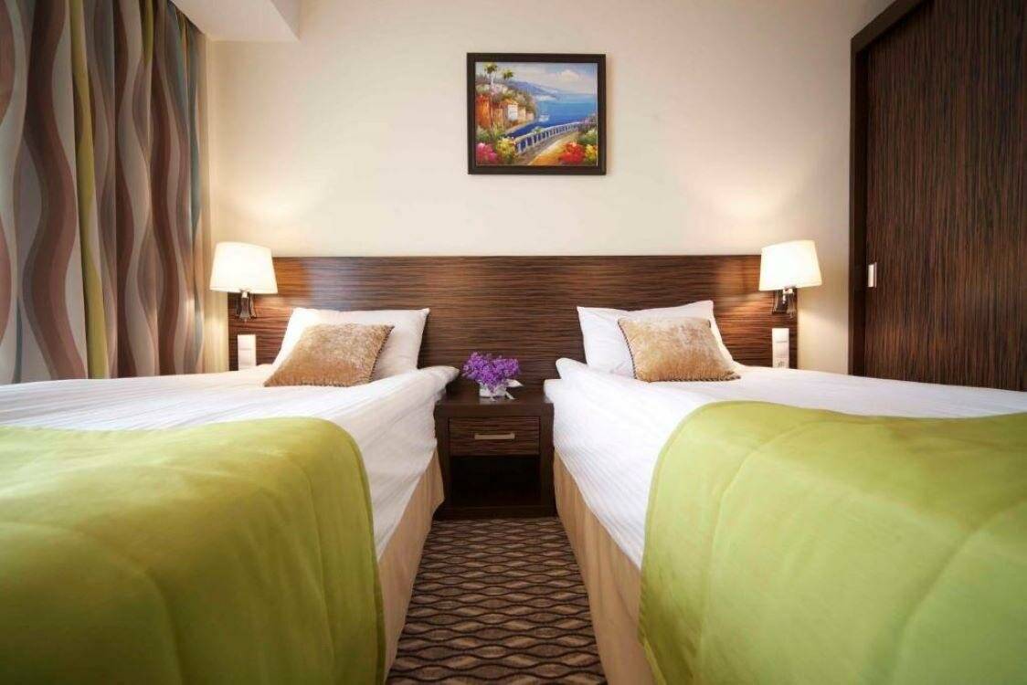 Фотографии номера Номер стандарт премиум с 2 односпальными кроватями в Гостинице Жемчужина Сочи